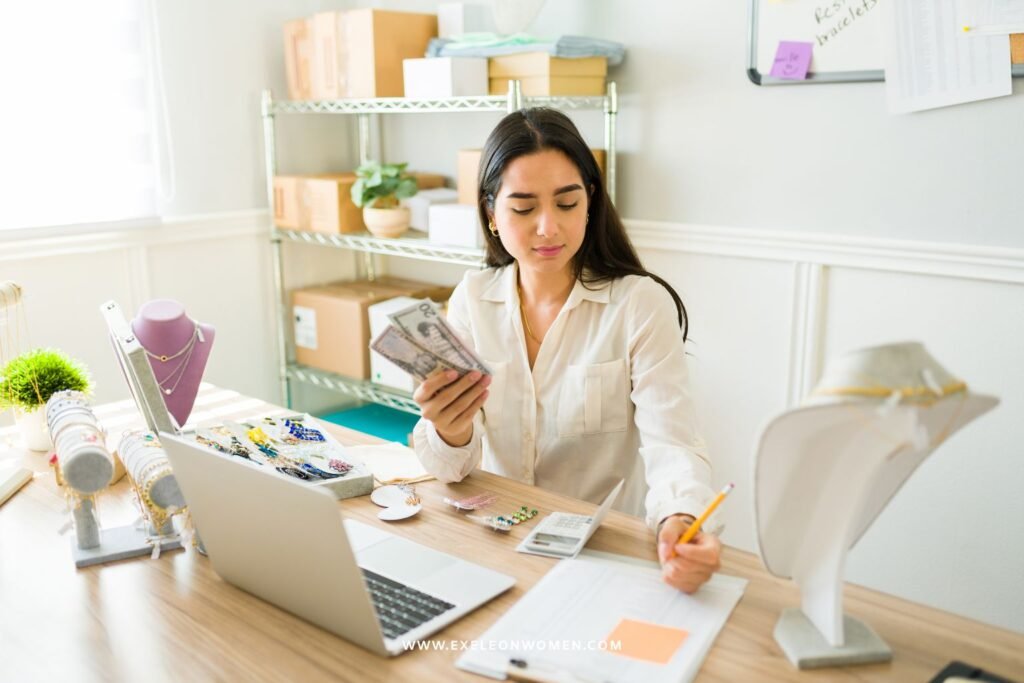 A woman planning funding options for her business.